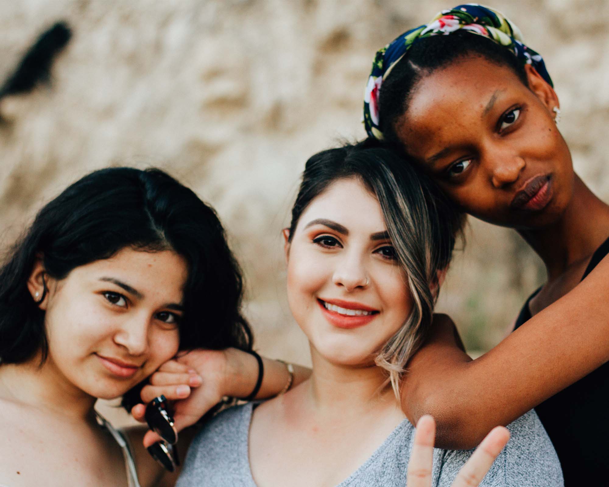 group of women smiling at the camera