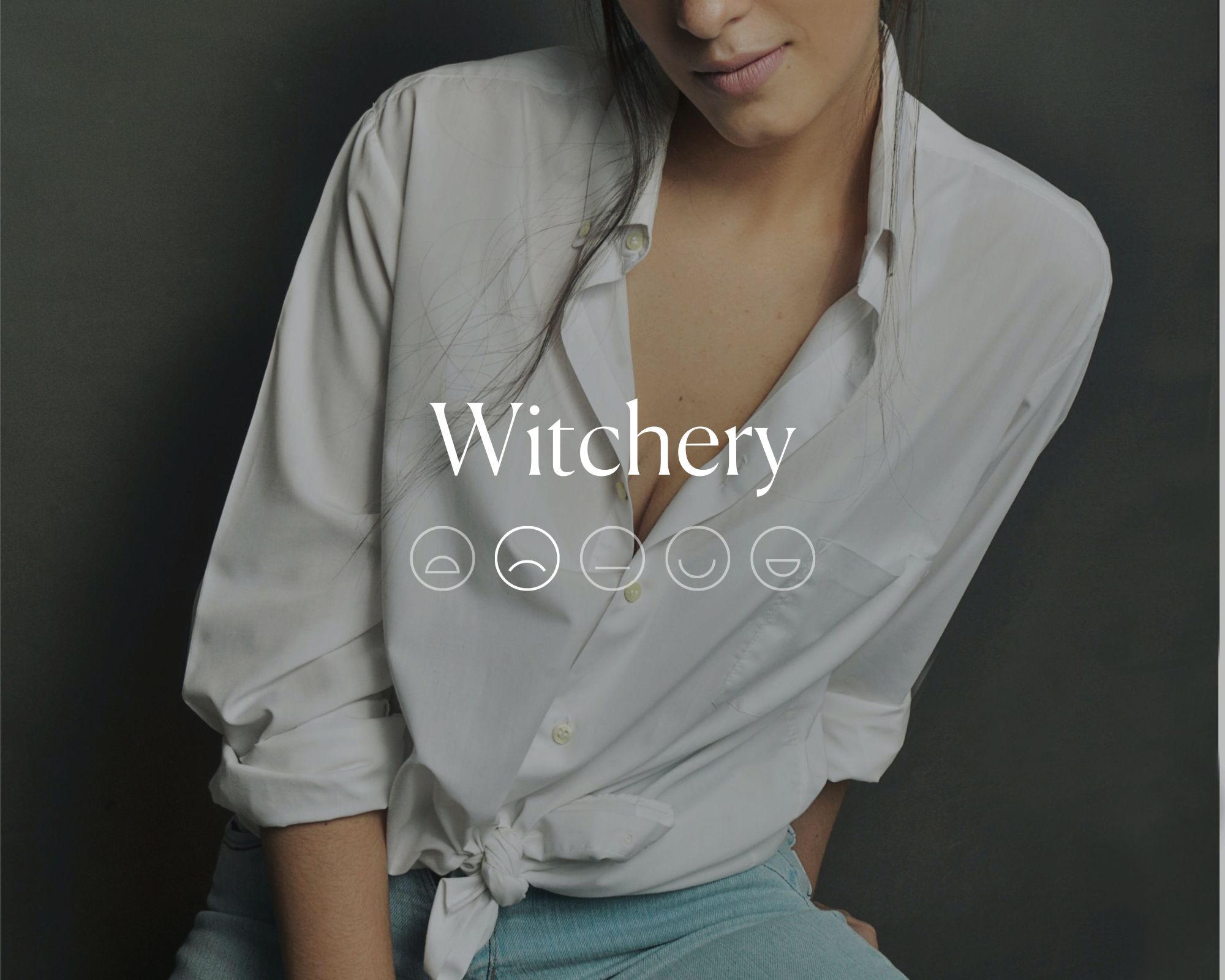 Someone in a white silky top with the word Witchery overlaid in white above a row of emoji faces with the sad face highlighted.