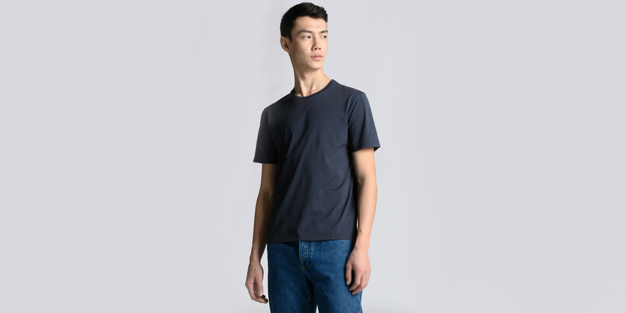 man wearing black asket t-shirt