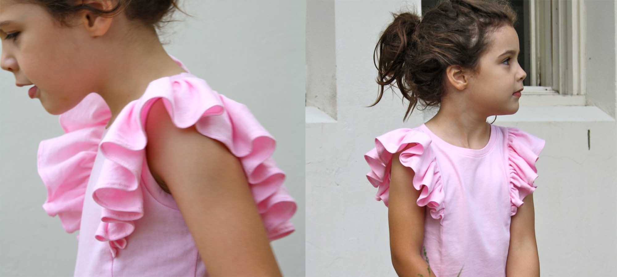 girl wearing pink little emperor t-shirt