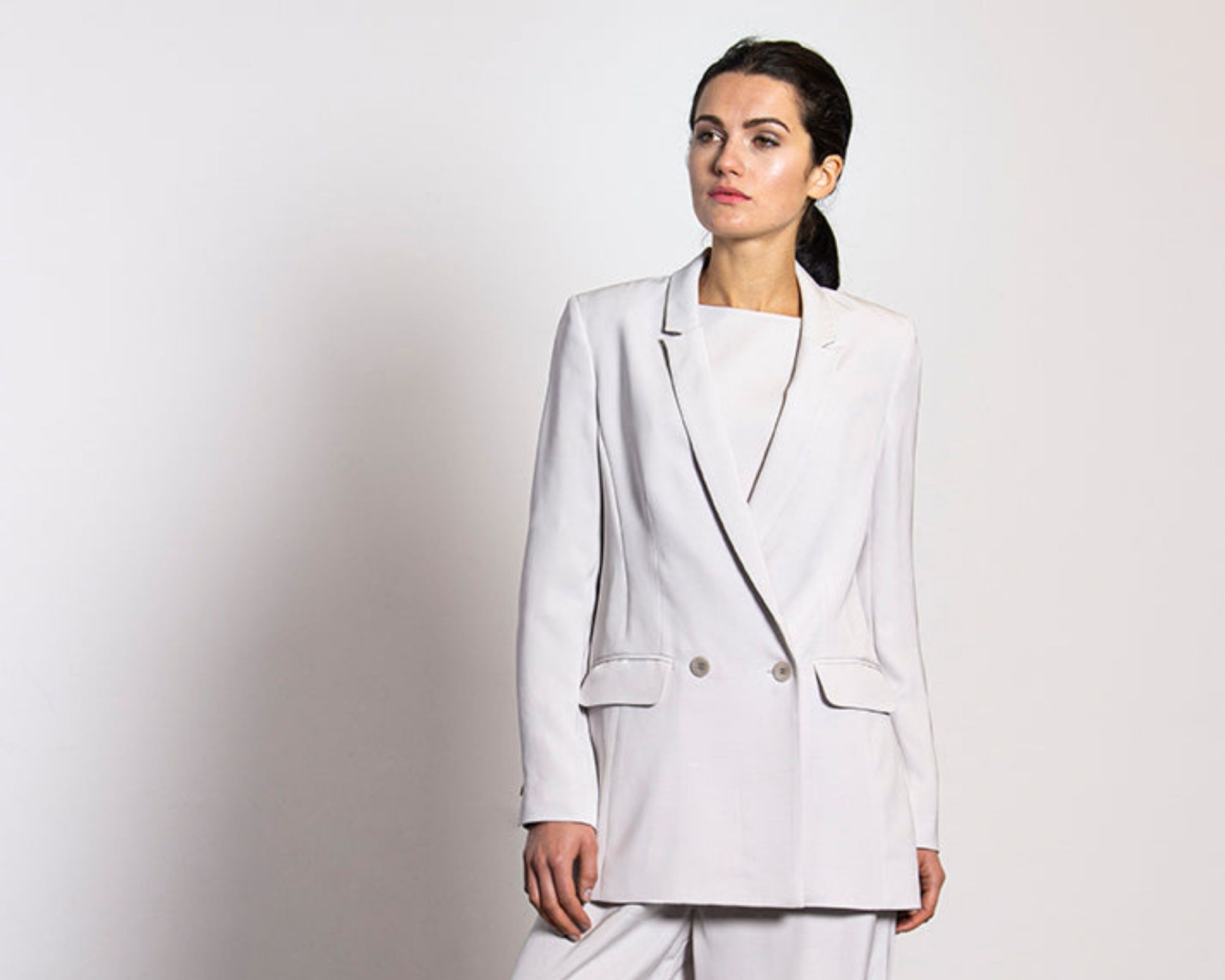White oversized lyocell blazer modelled for designer Nina Rein.