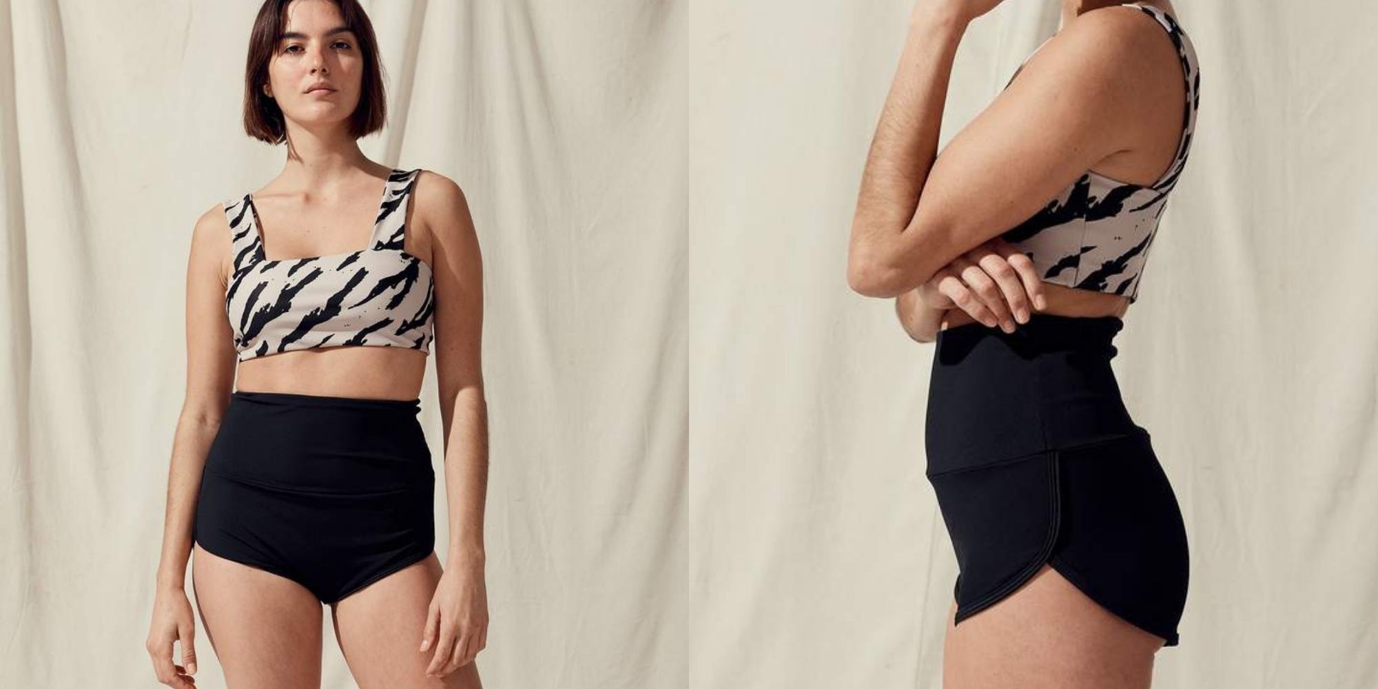 woman wearing black high waisted surf short by Salt Gypsy