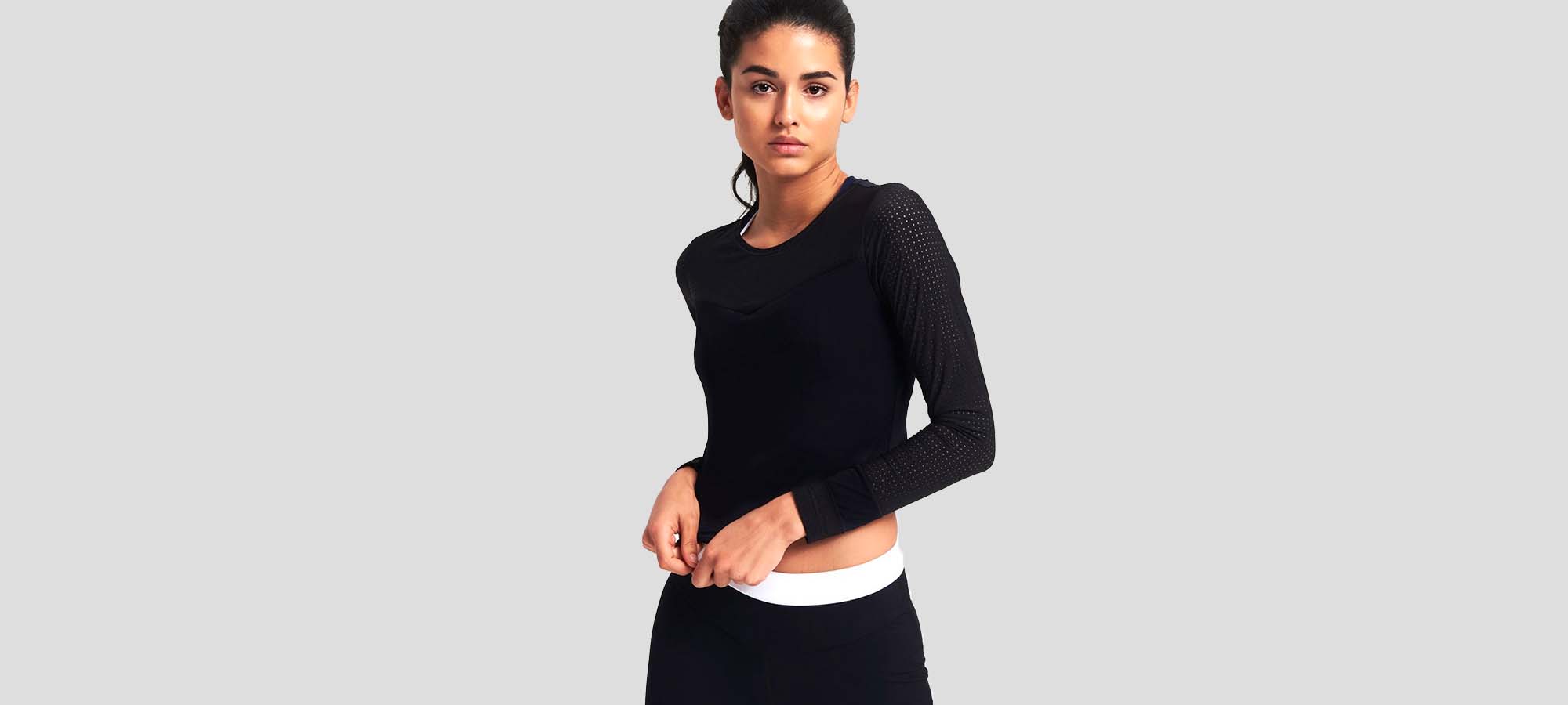 woman wearing black adrenna top