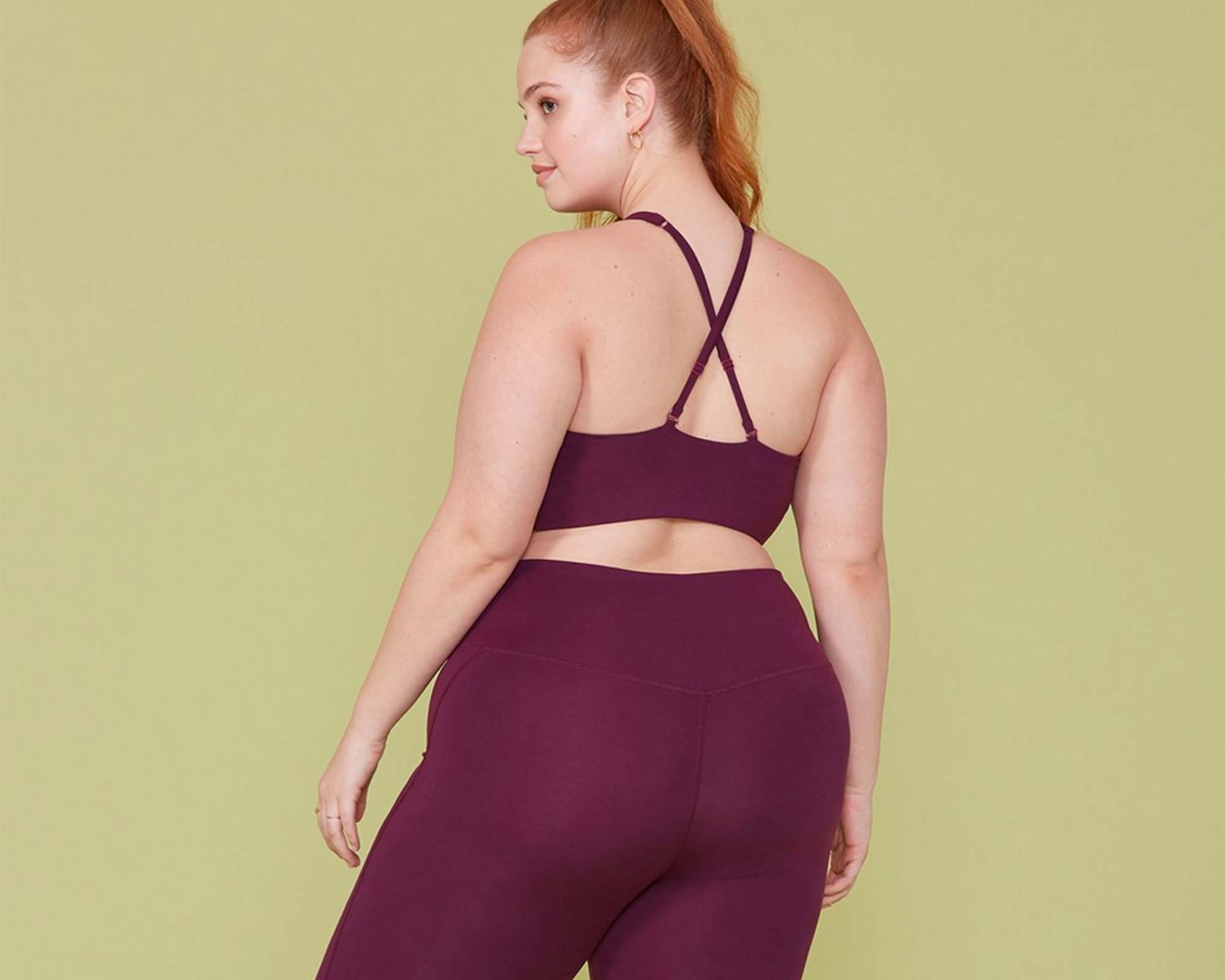 feature image woman wearing girlfriend collective leggings