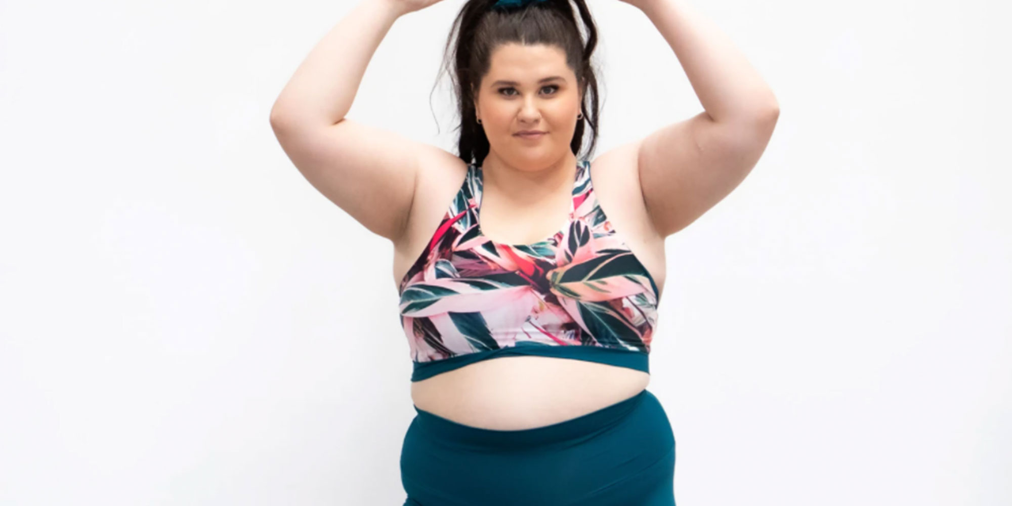 woman wearing reversible sustainable elle evans yoga bra