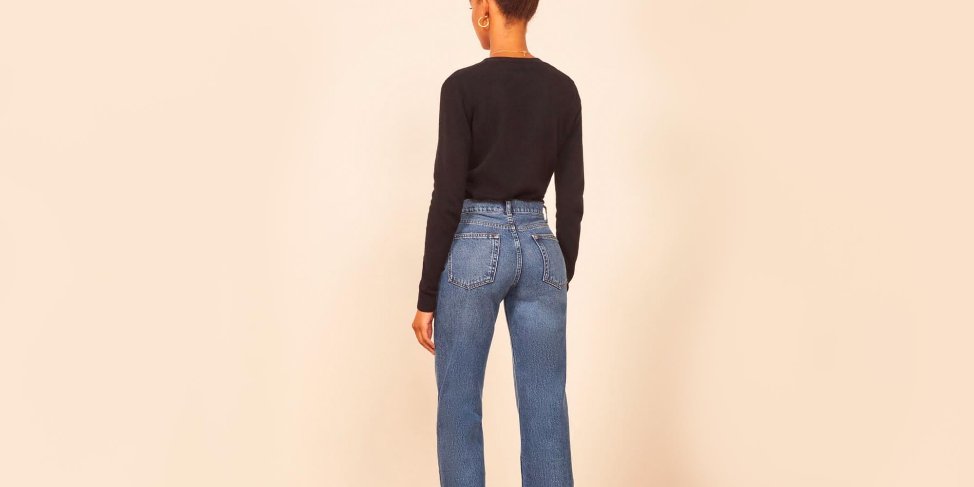 woman wearing reformation jeans