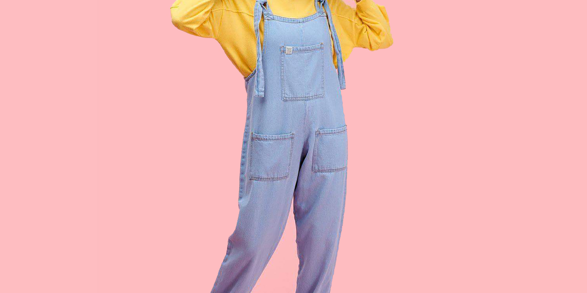 Girl in light wash ethical dungaree by Lucy & Yak