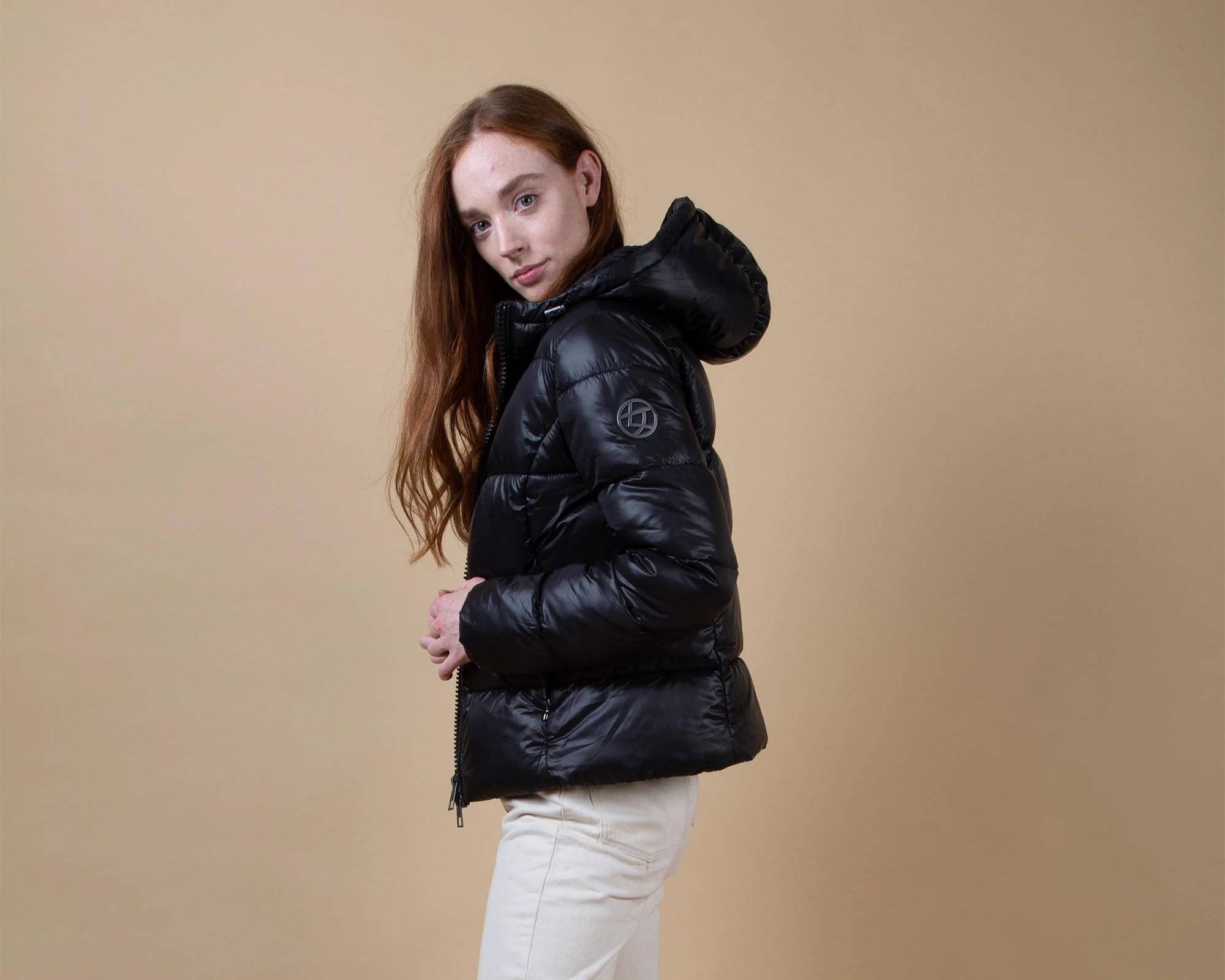 A black vegan sustainable winter essential puffer jacket ethically made by Culthread.
