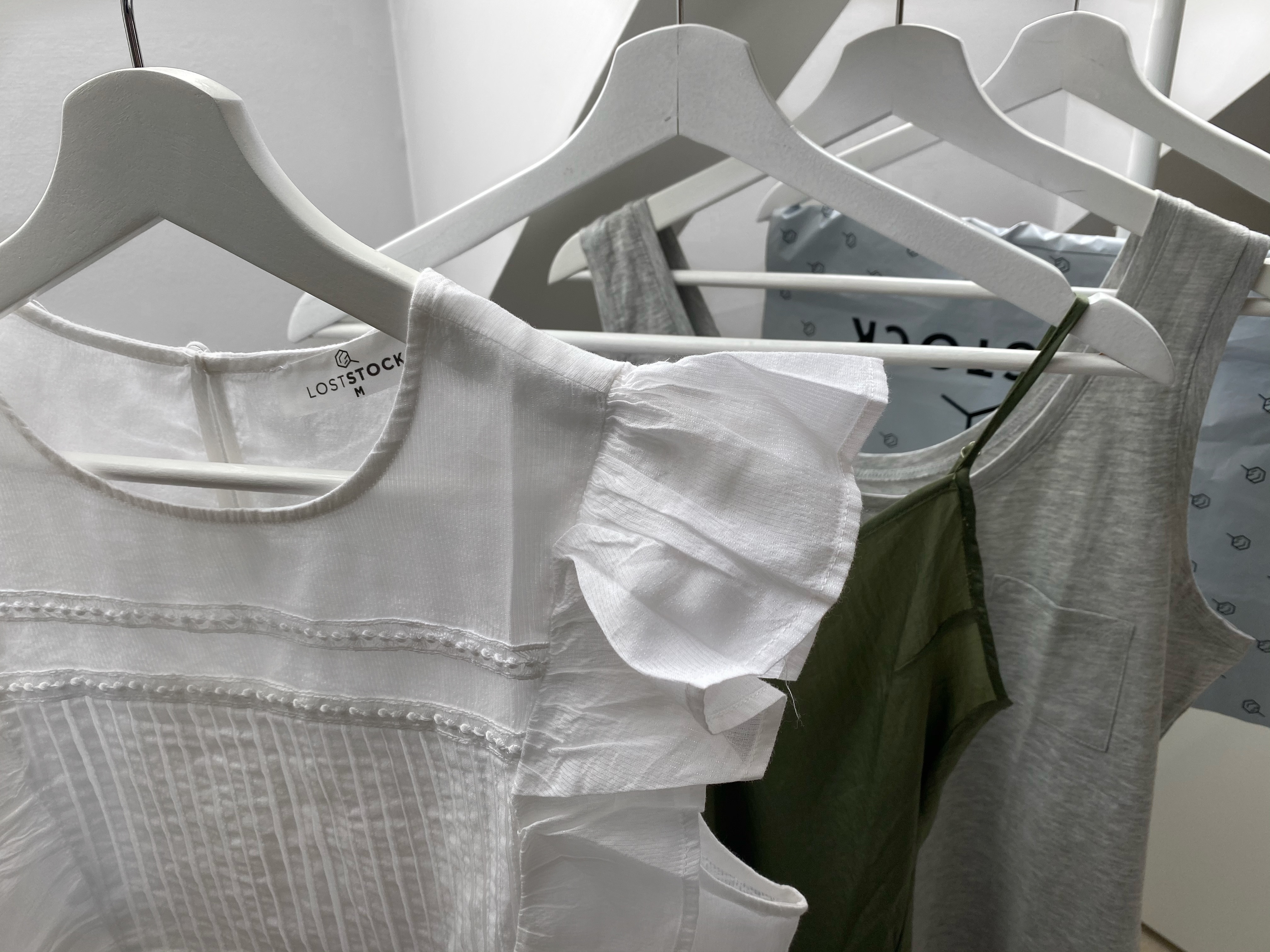 Lost Stock rescued garments on hangers