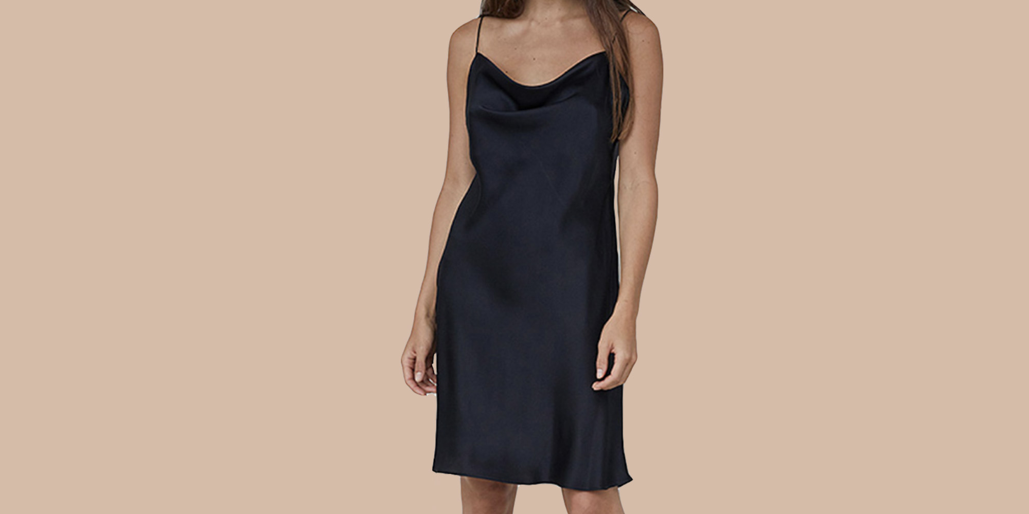 Woman in black sustainable slip dress by Natalija