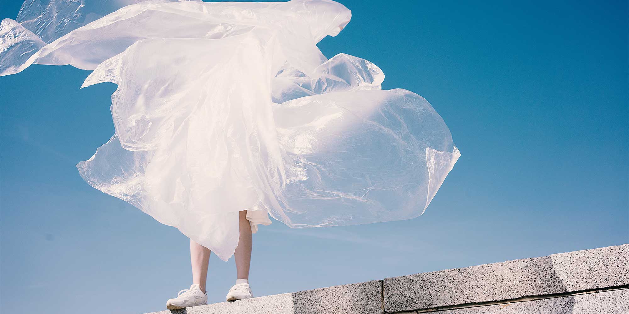 woman in white plastic cloth