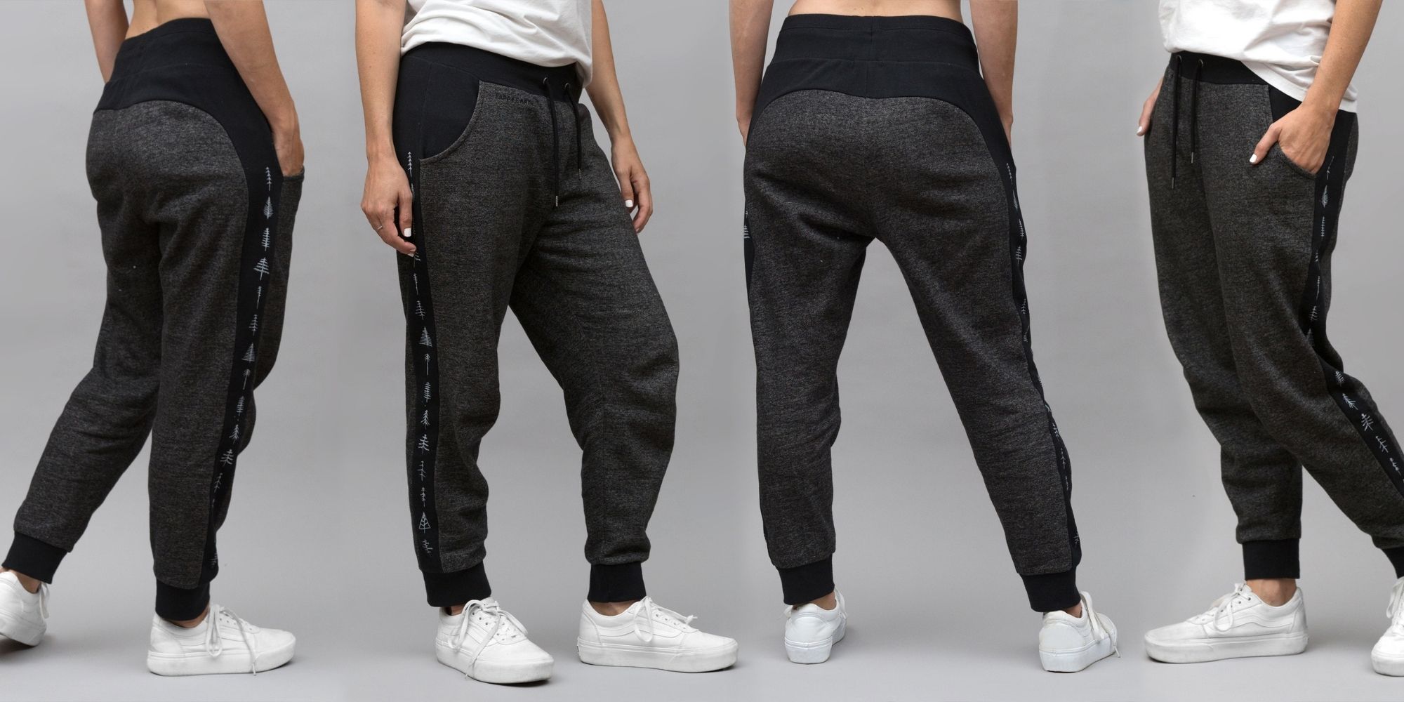 person wearing charcoal and black sustainable joggers by Happy Earth