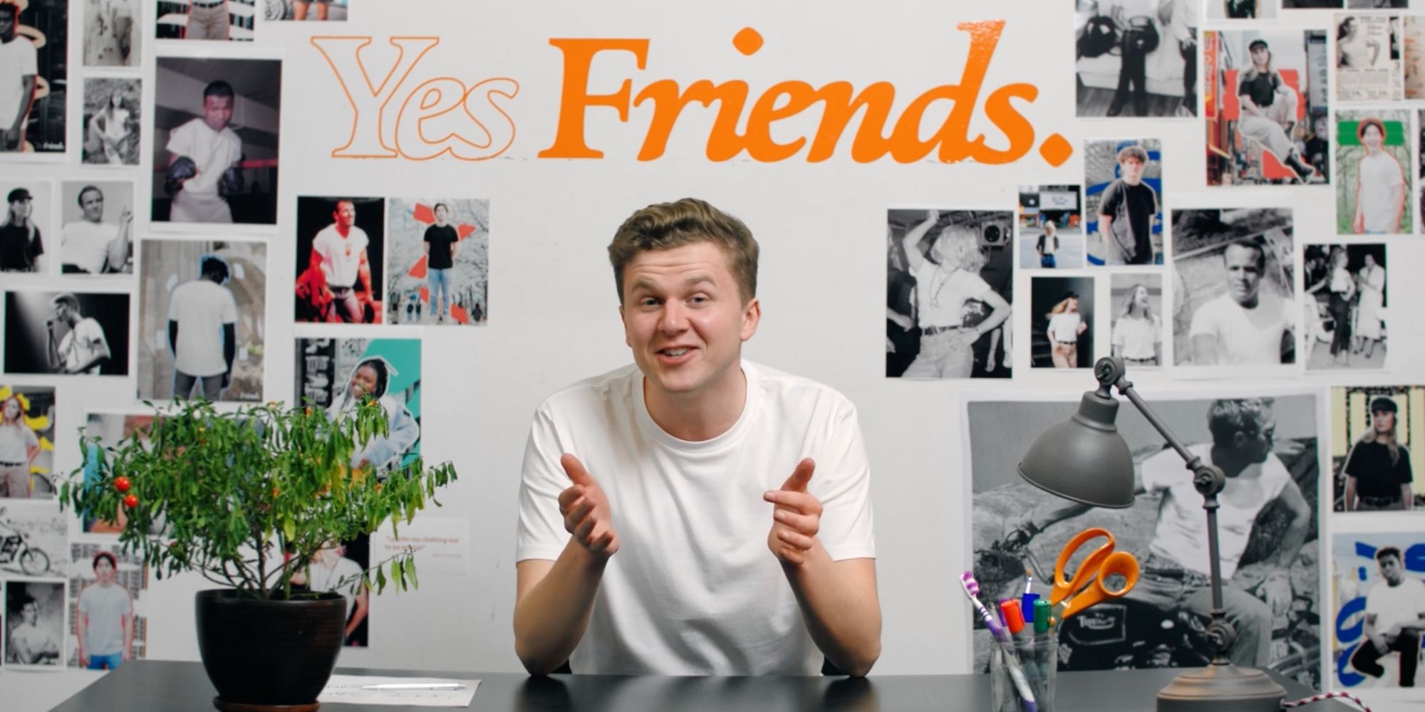 Yes Friends founder Sam Mabley in front of product photo wall
