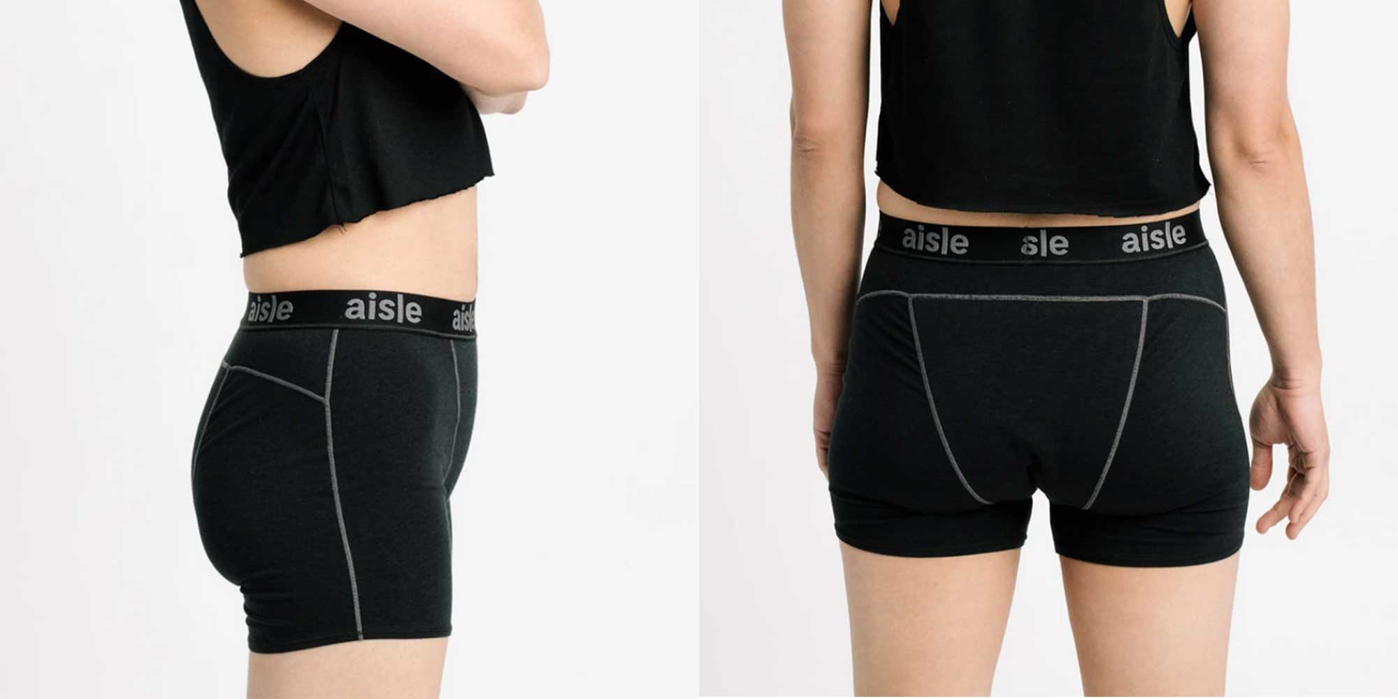 person wearing black sustainable period boxer briefs by Aisle