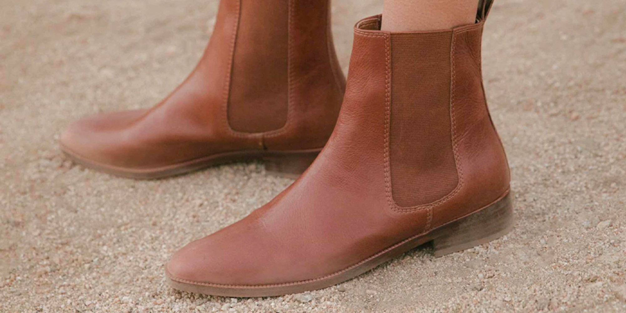Woman in ethical boots by Christy Dawn