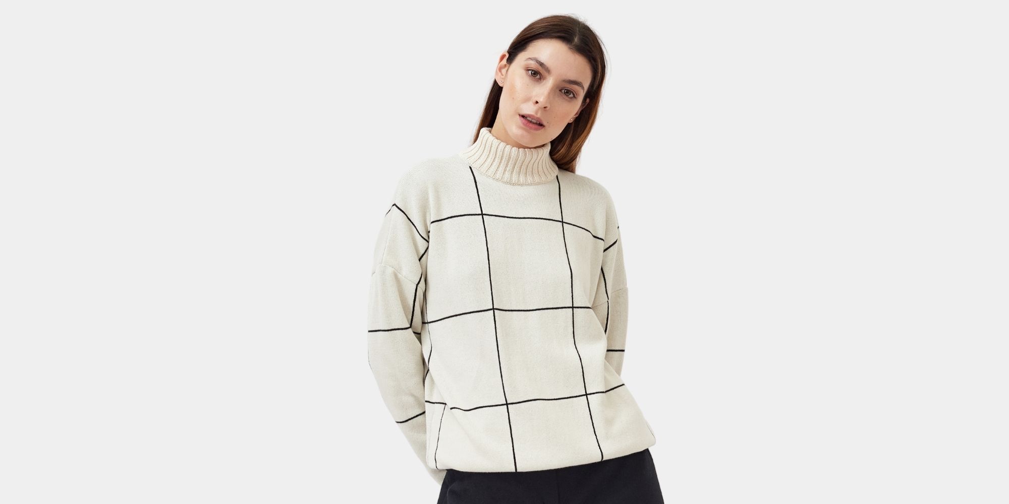 woman wearing cream and black checked jumper by Mila.Vert