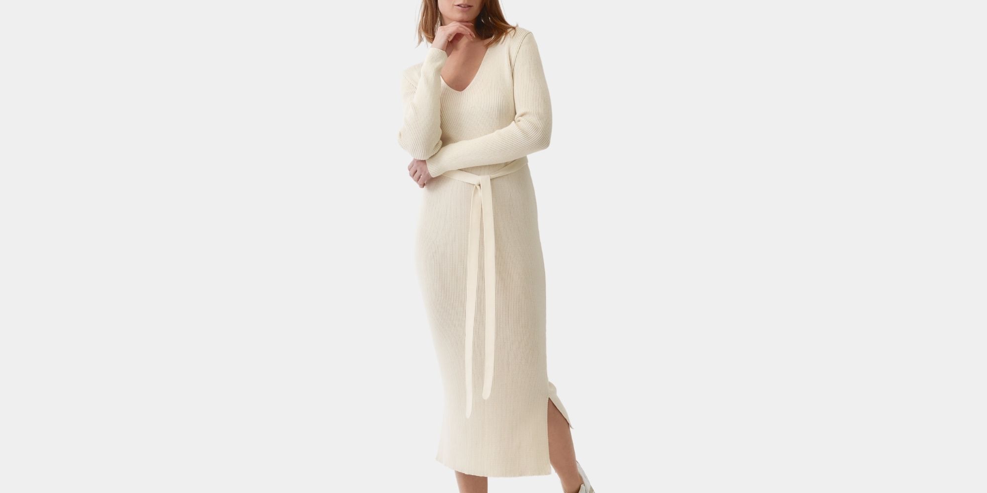 woman wearing cream figure hugging organic cotton dress ethically made by Mila.Vert