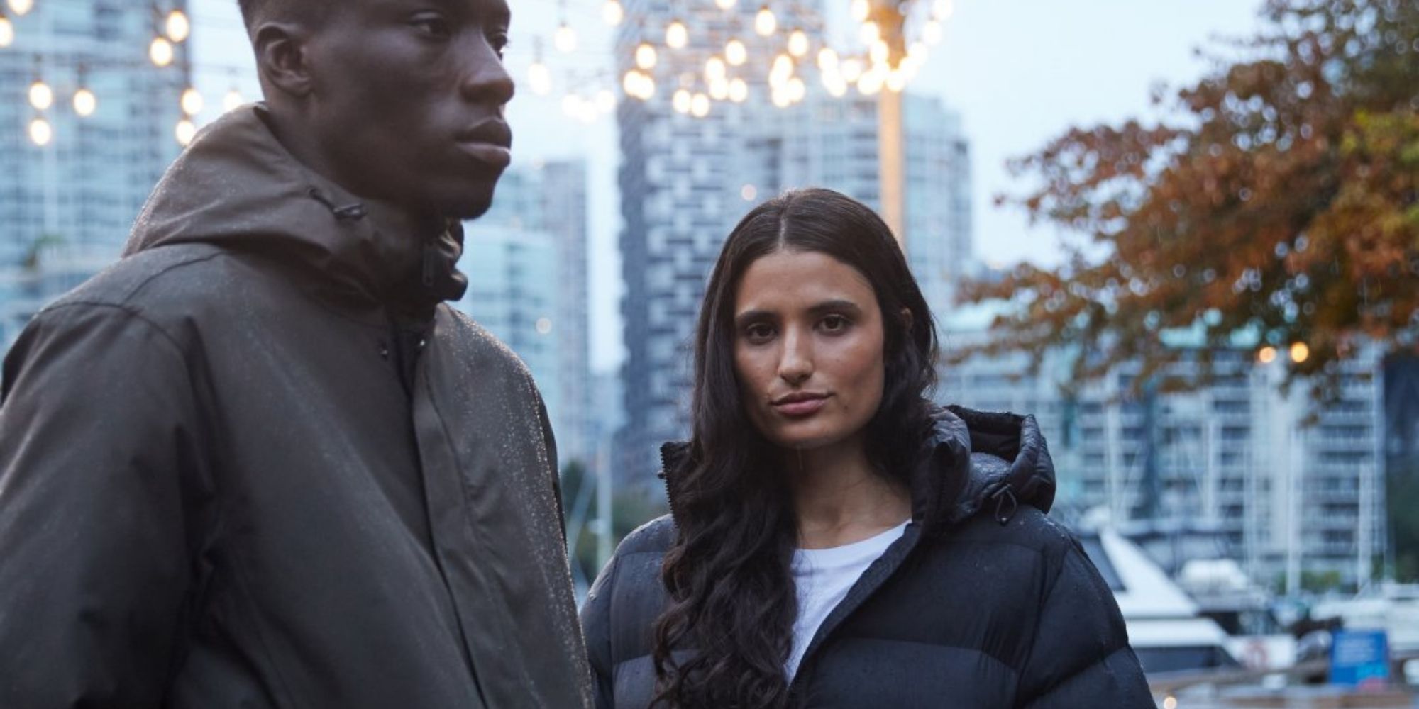 two people wearing sustainable outerwear designed by tentree