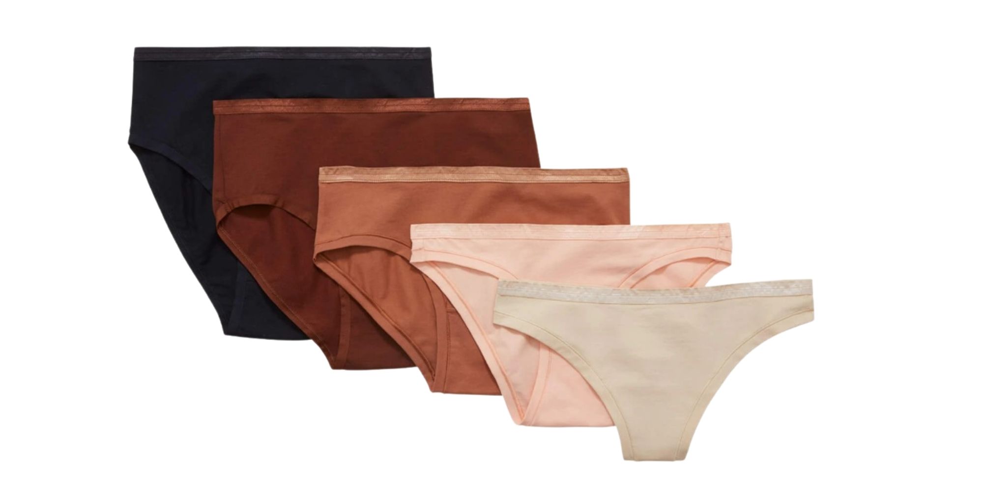 Product shot of Knickey's five styles of organic underwear layered together in their Starter Set.
