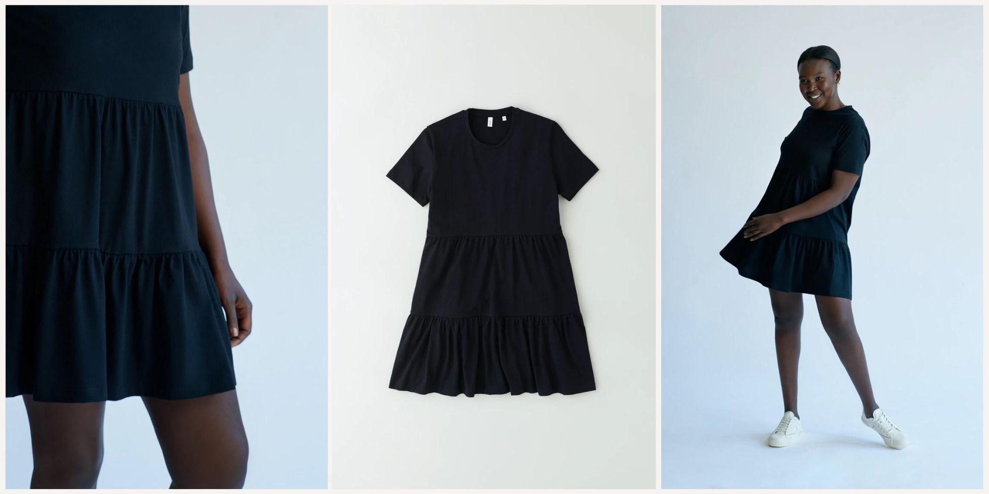 Someone swishing in a black tiered midi dress ethically made by Kotn.