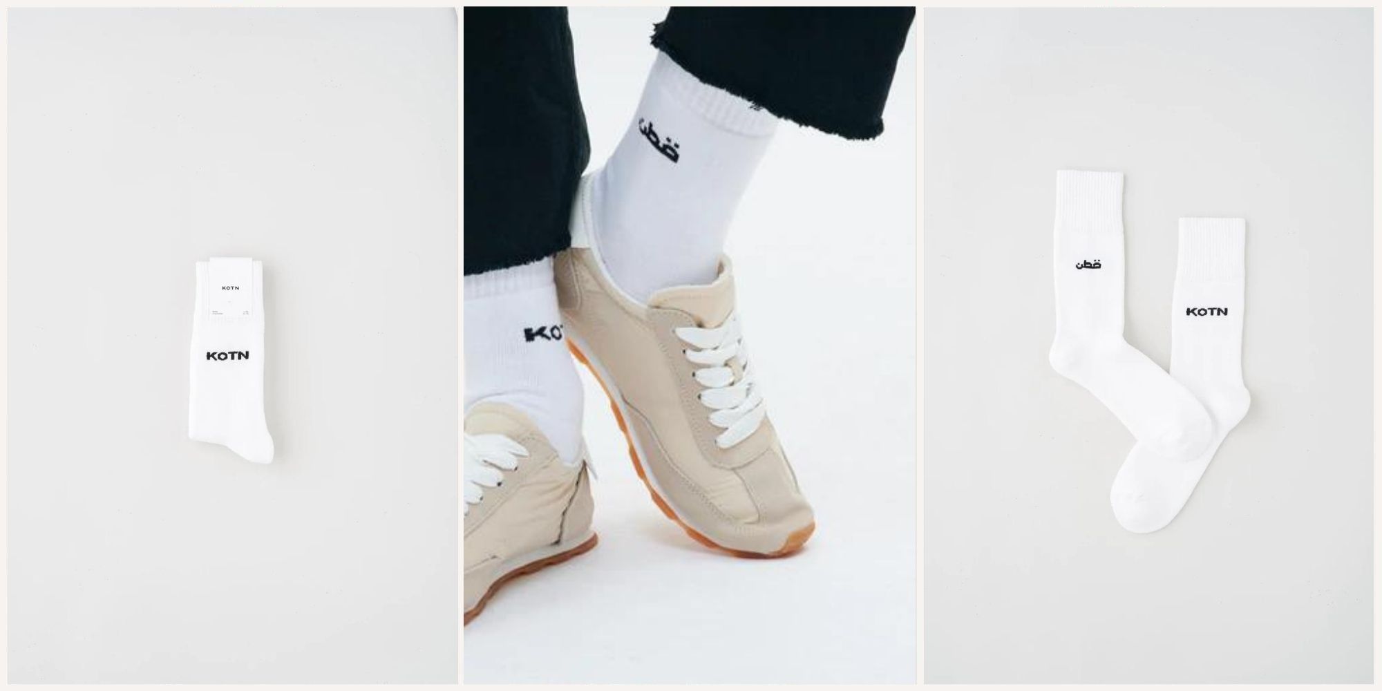 White ethically made cotton crew socks featuring the Kotn logo in English and Arabic.