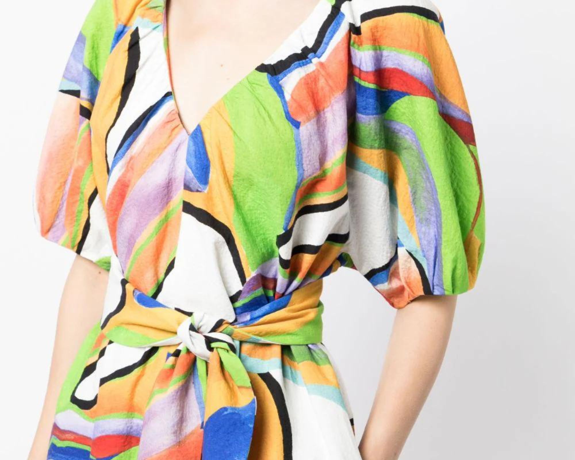 A colourful cinched waist luxurious midi dress by Mara Hoffman.