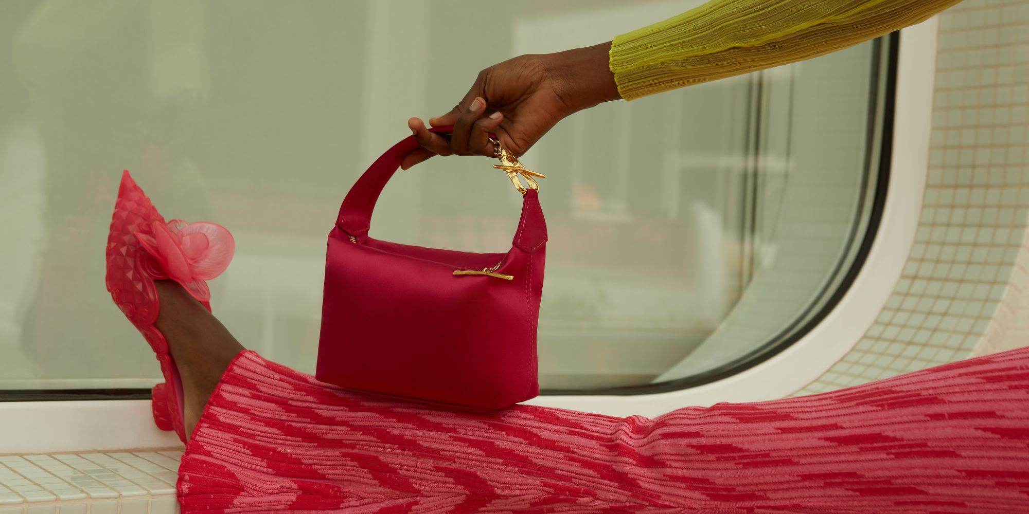 Pink satin sustainable handbag by Mashu.