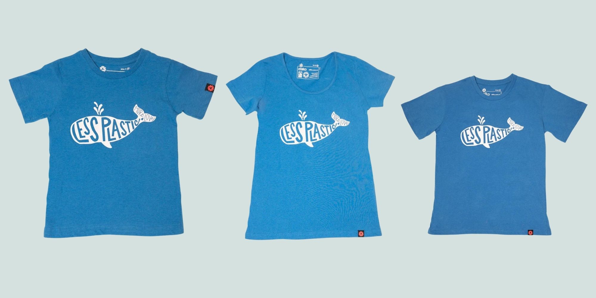 Three blue organic cotton Less Plastic More Love t-shirts by Etiko.