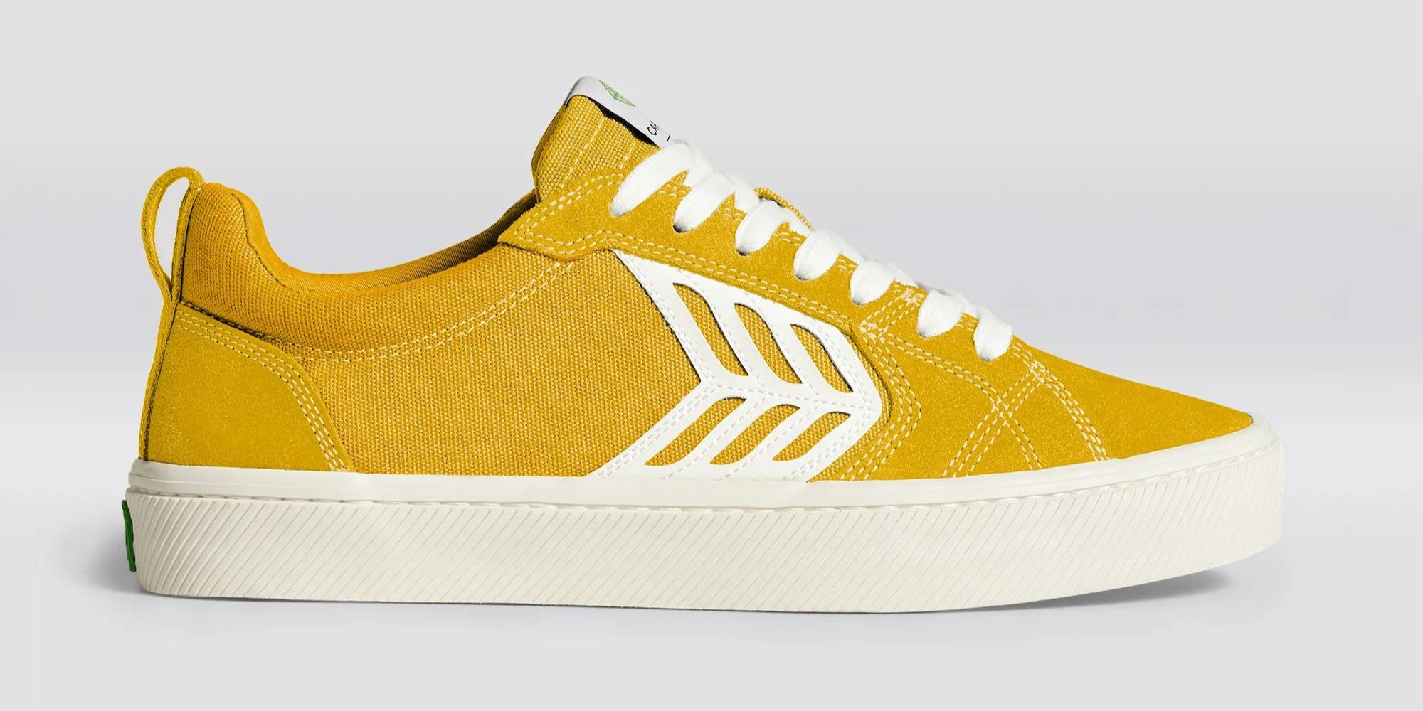 Yellow suede skater sneakers by CARIUMA.