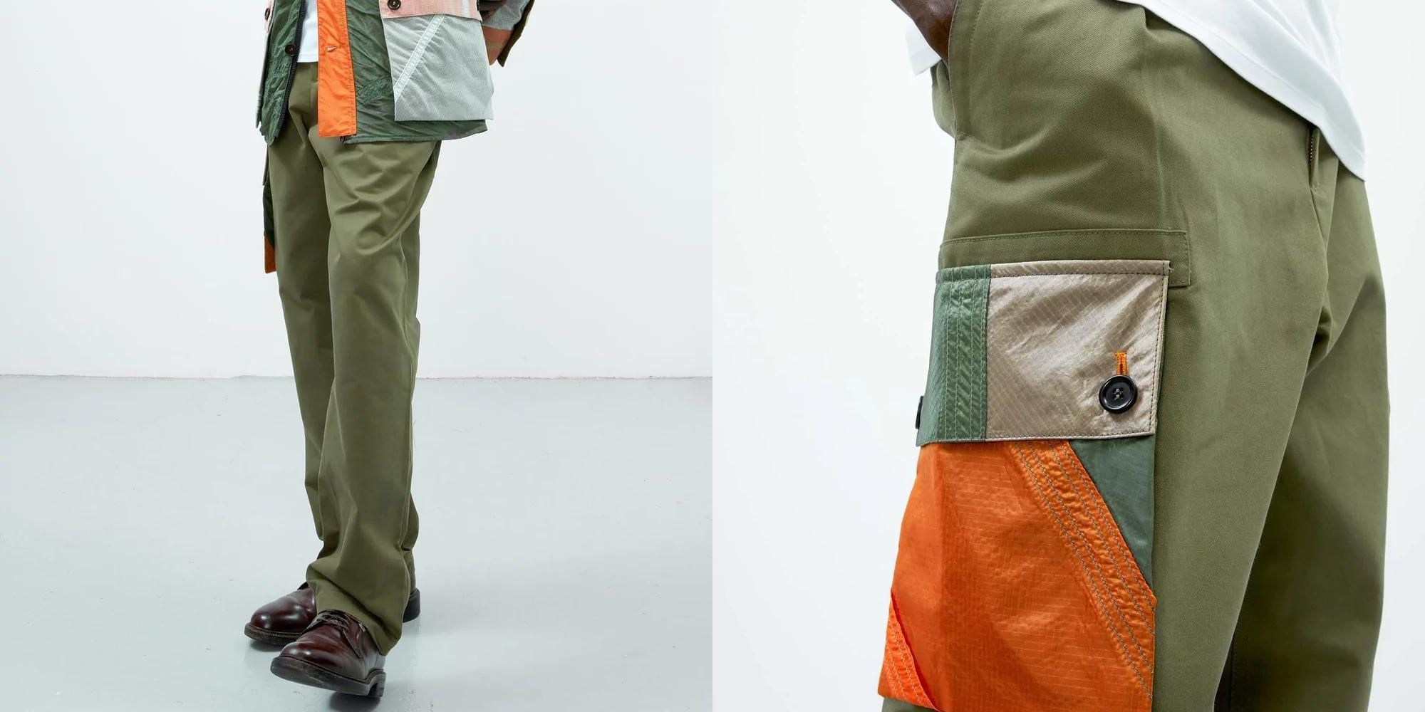 Green RAEBURN cargo trousers with an upcycled parachute silk pocket.