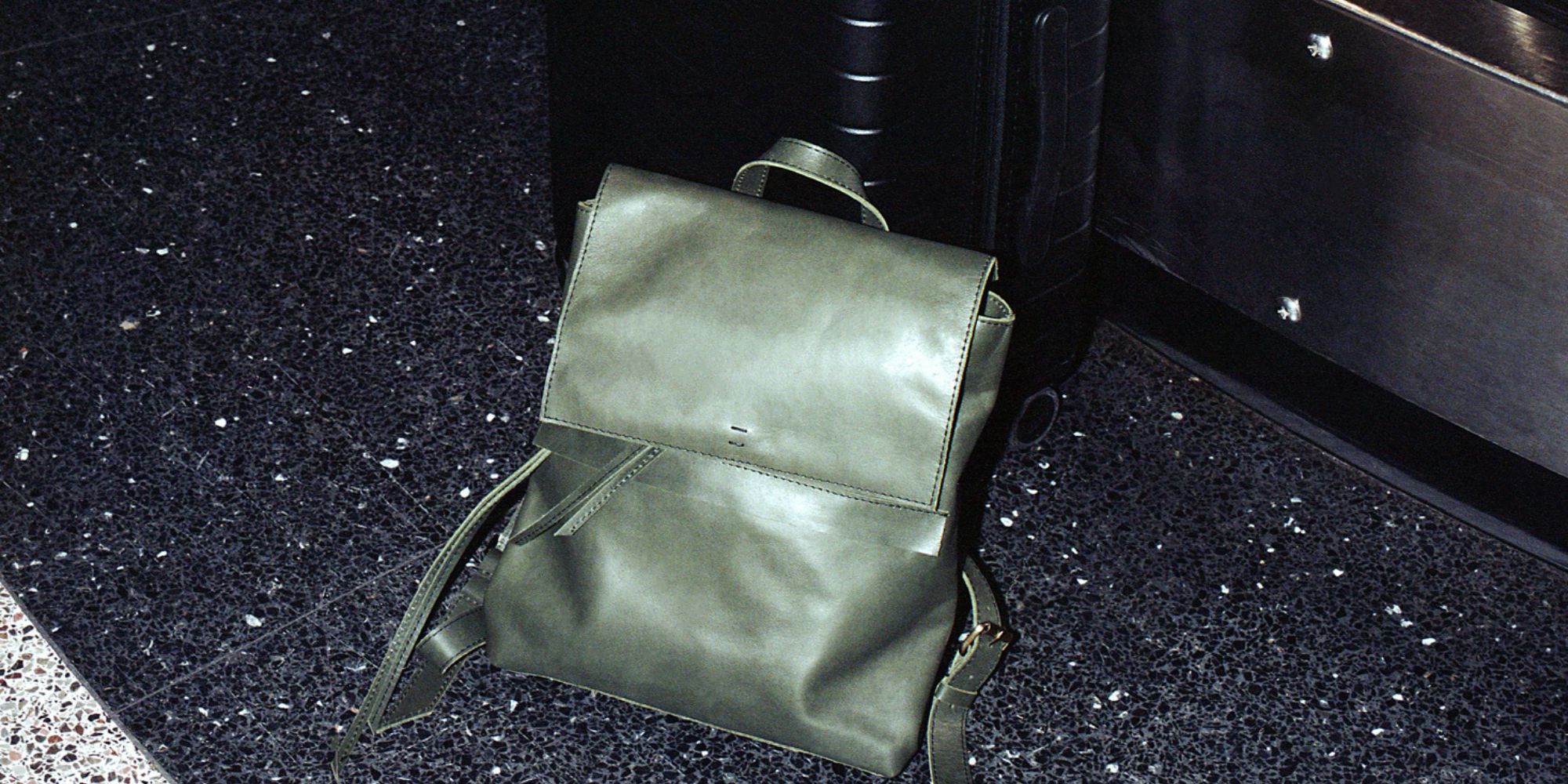 The green Addis backpack by Raven + Lily.