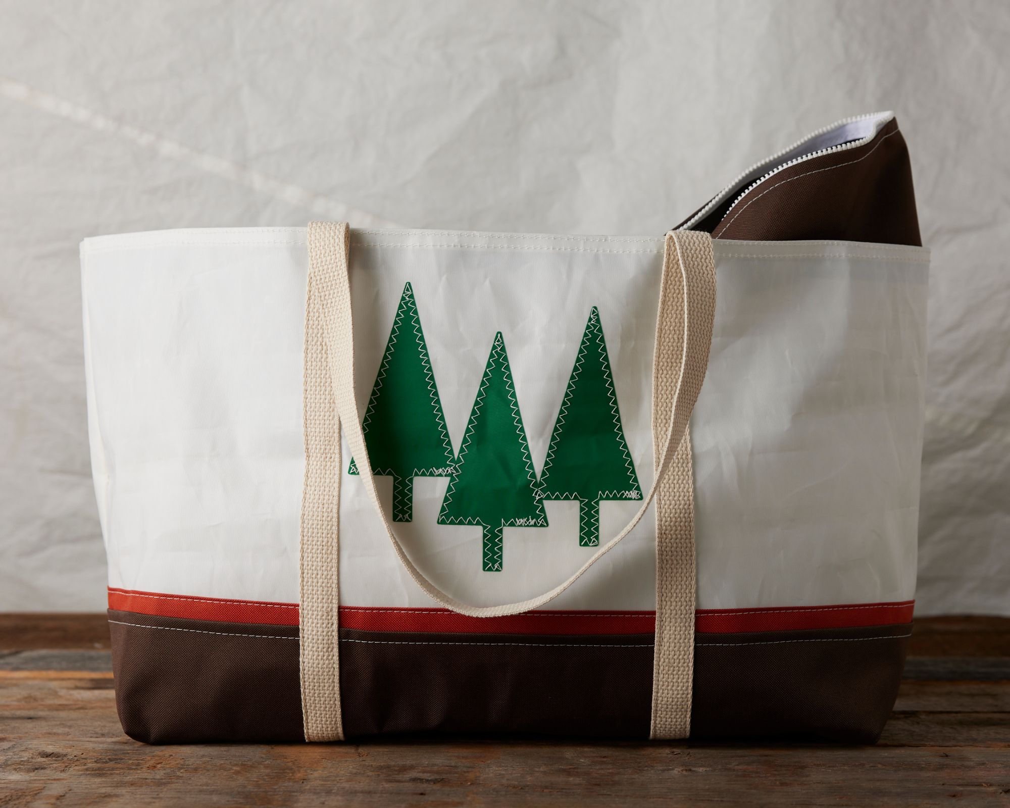 A pine tree print upcycled sail tote by Casco Totes.