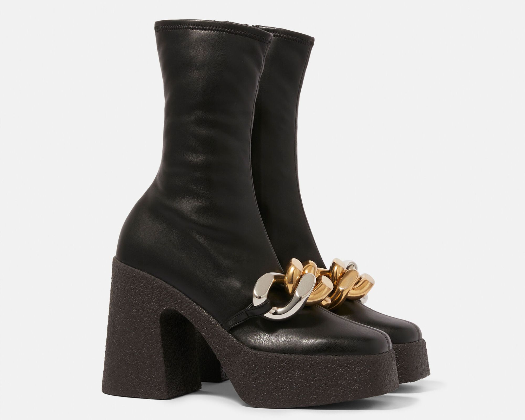 Black vegan leather high heeled luxury boots with gold chain accents designed by Stella McCartney.
