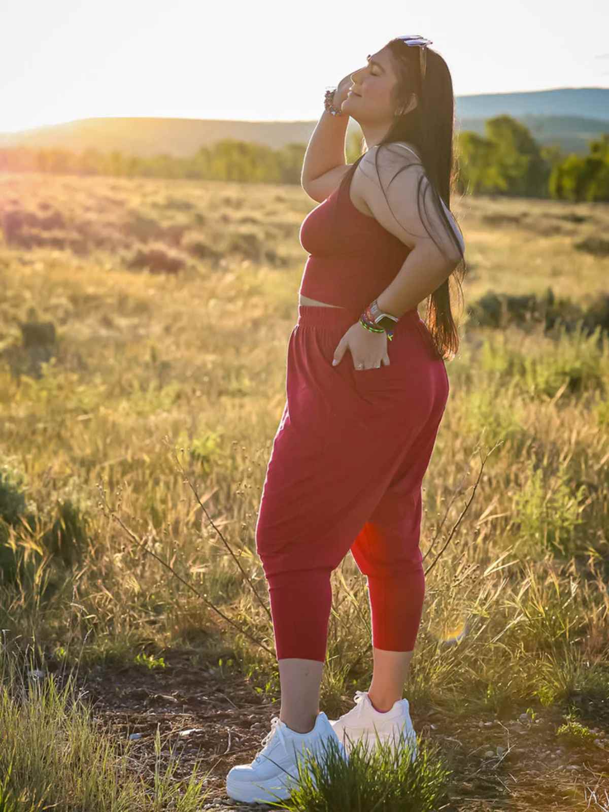 Person in grass wearing pink clothes from Miakoda