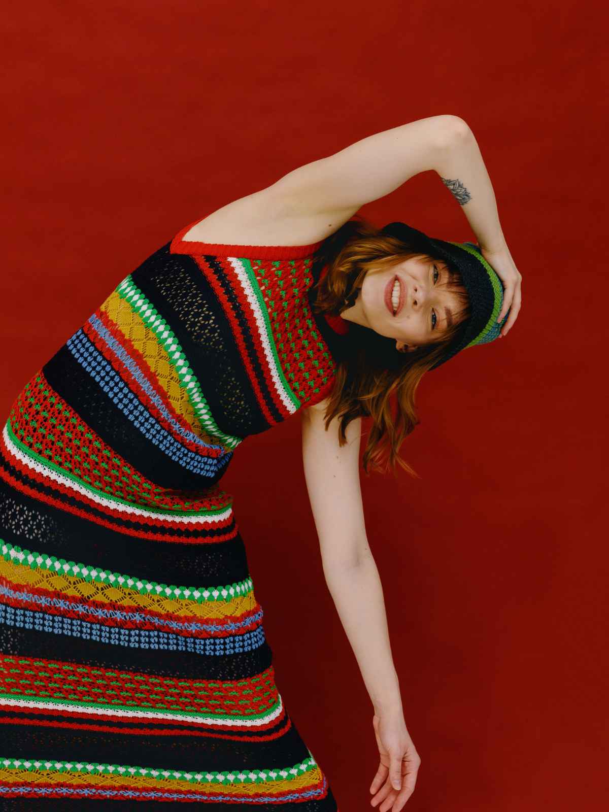 Person wearing bright patterned dress