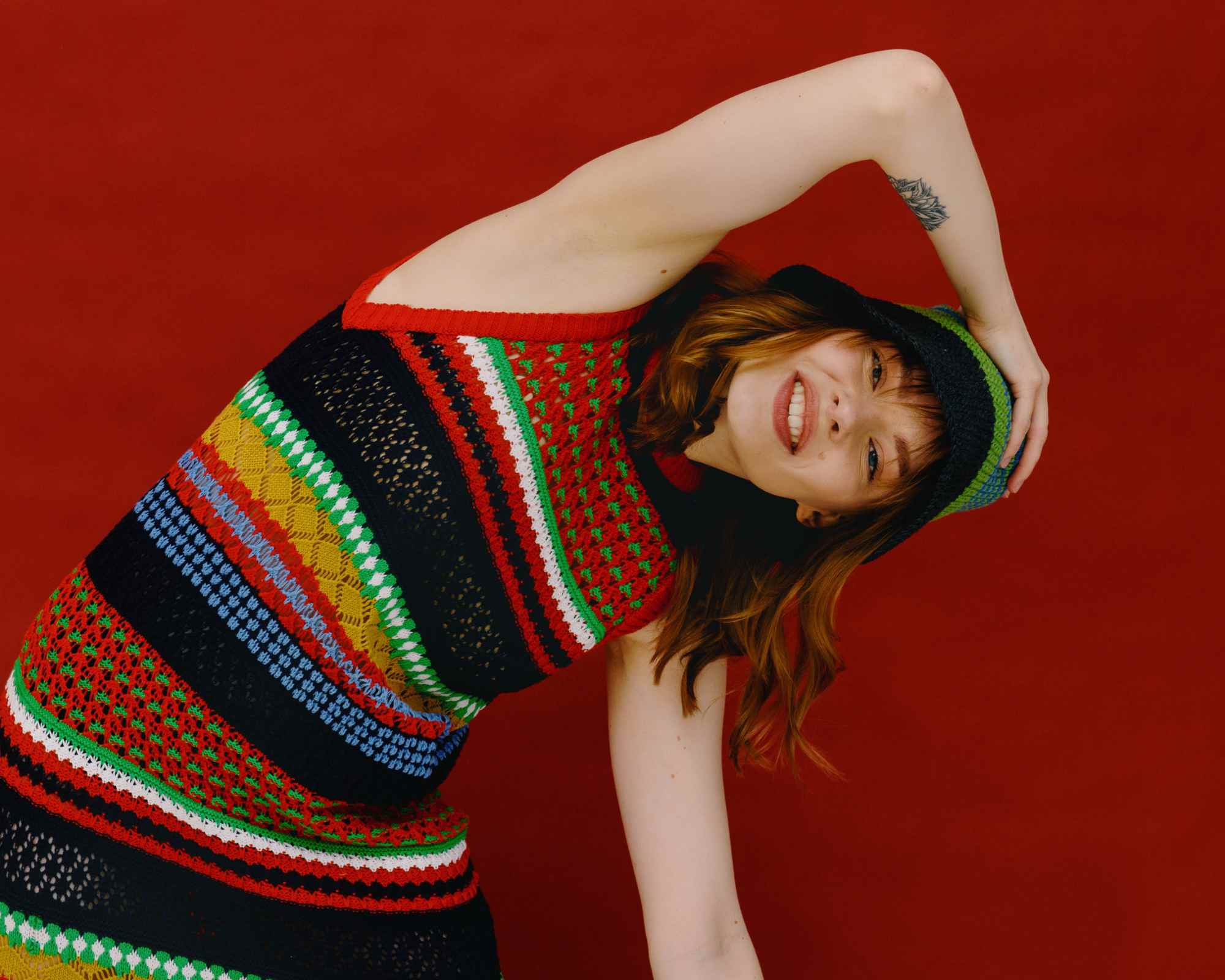 Person wearing bright patterned dress