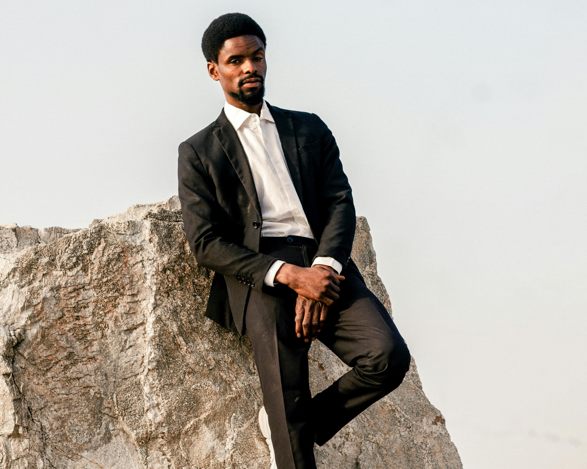 person wearing a black suit