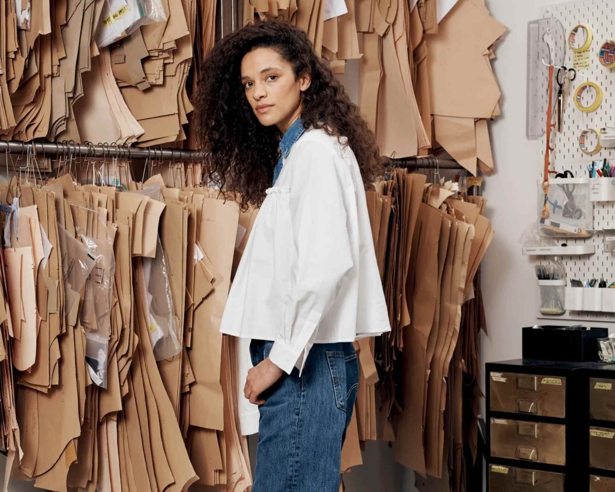 person in a pattern room wearing clothes from elv denim