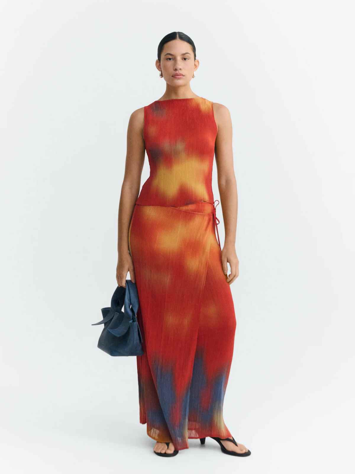 person wearing colourful dress from thinking mu