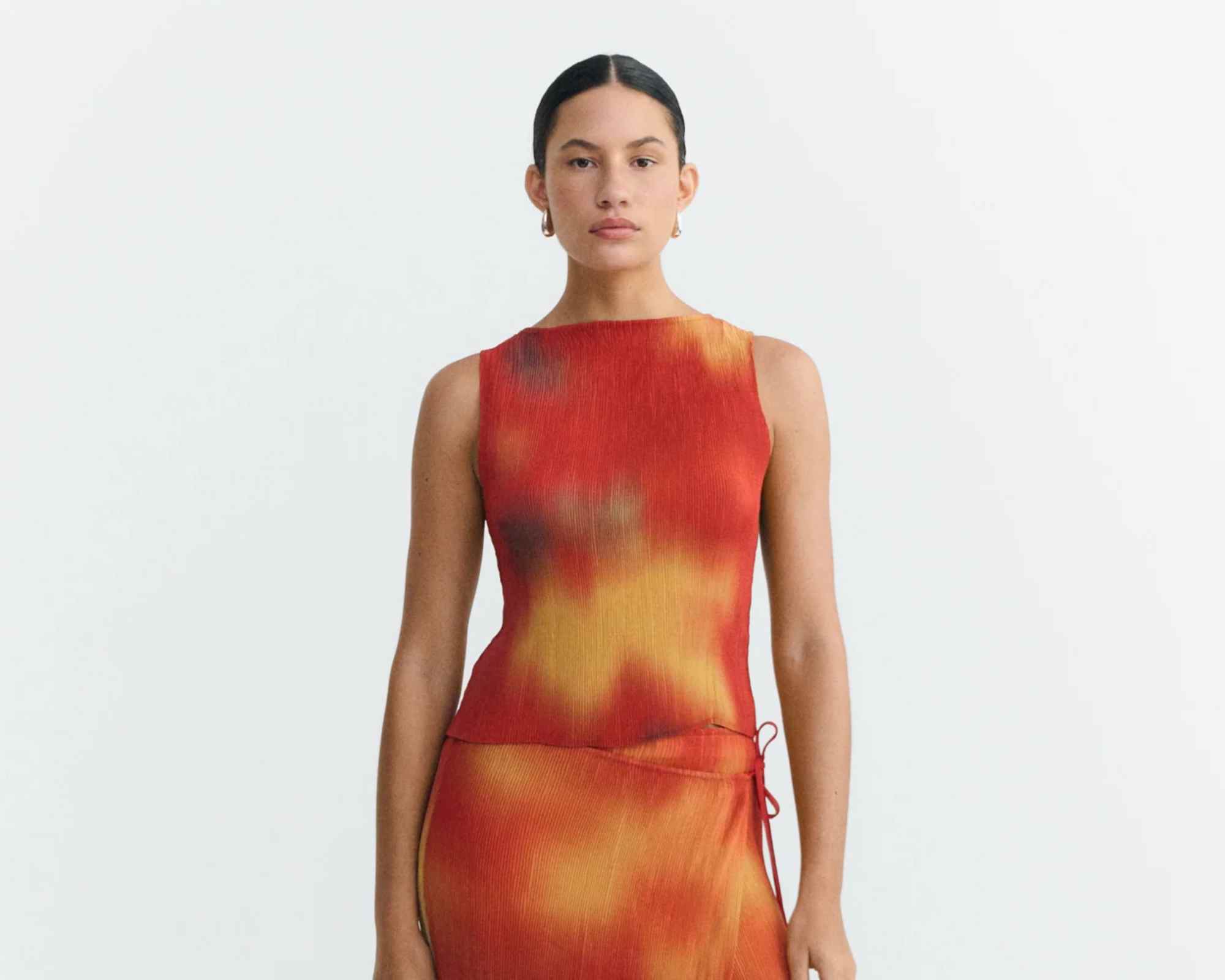 person wearing colourful dress from thinking mu
