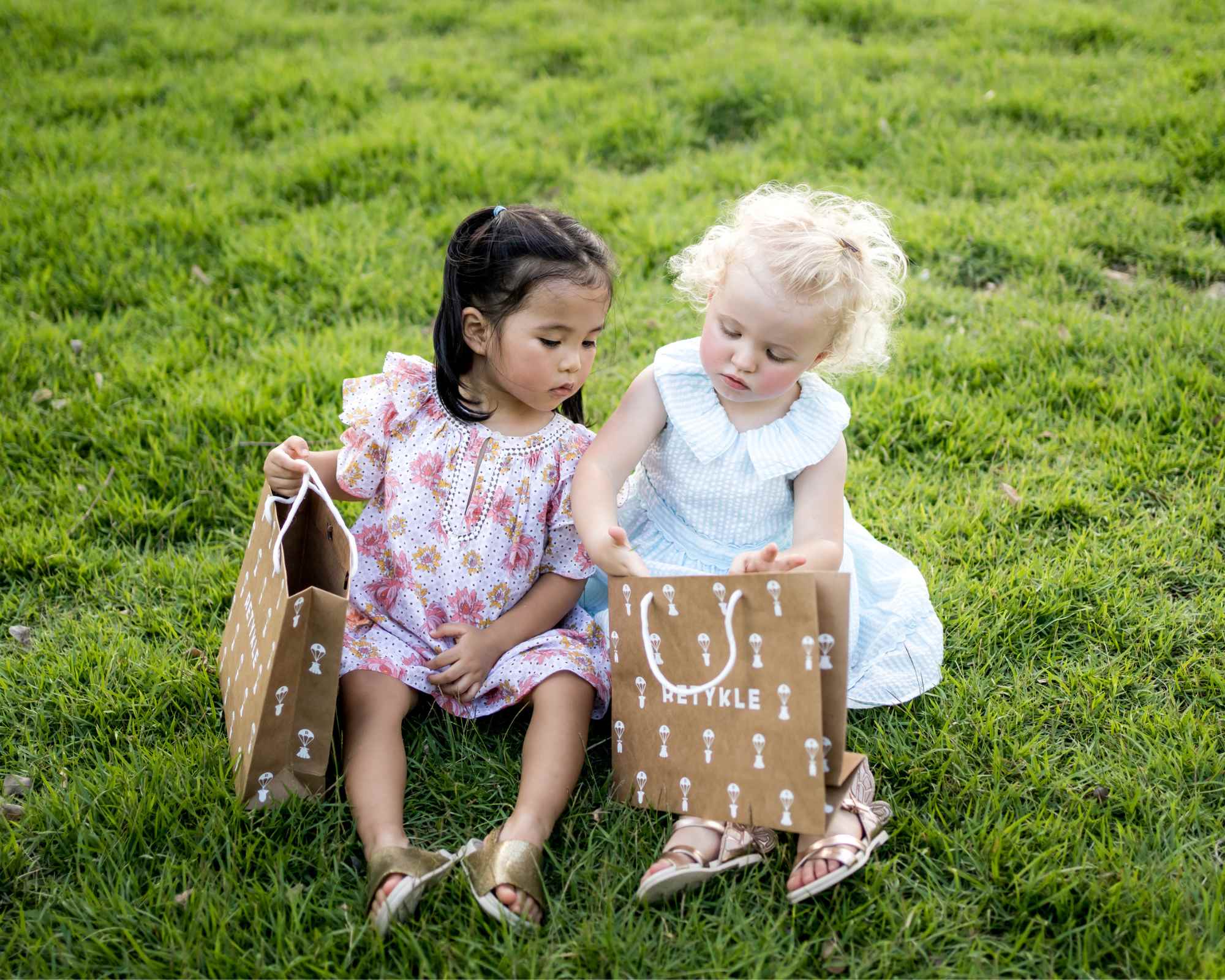children holding bags from Retykle