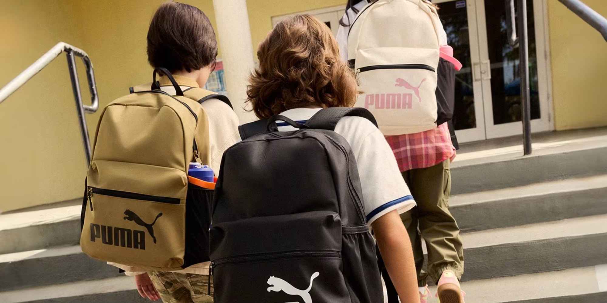 kids with puma backpacks on