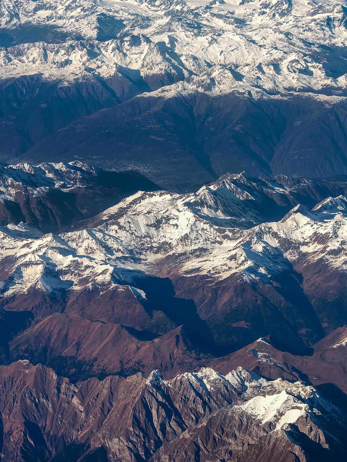 view of snow-capped mountains from above