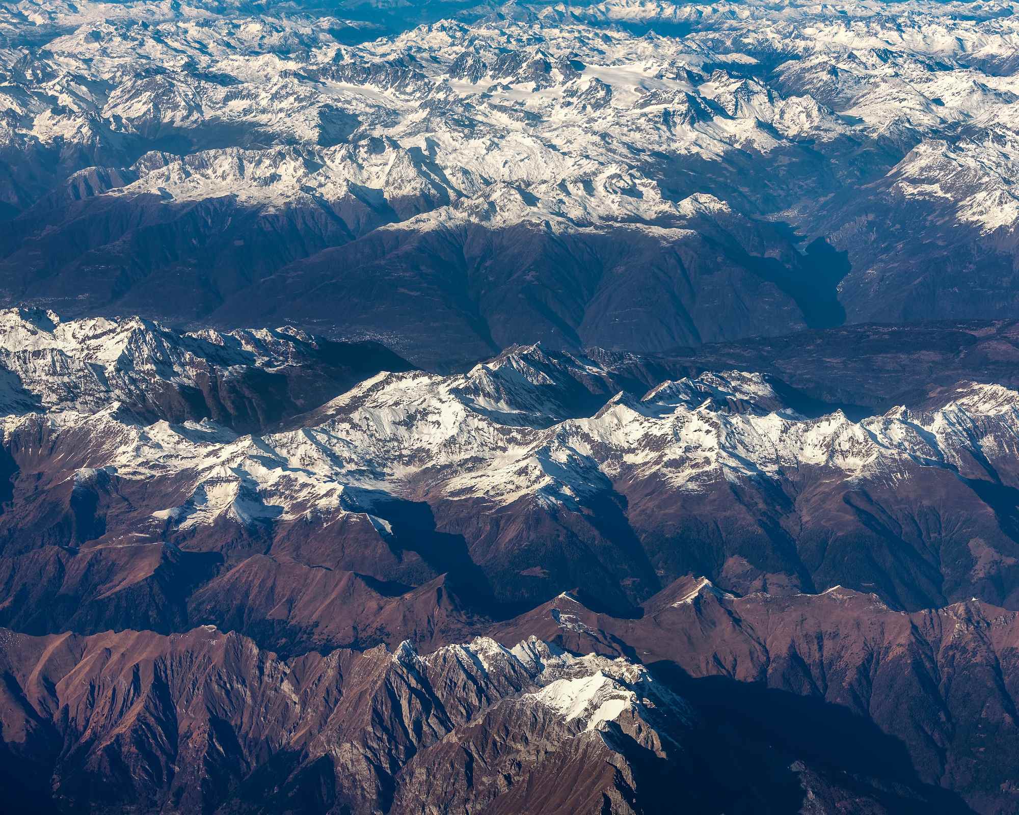 view of snow-capped mountains from above